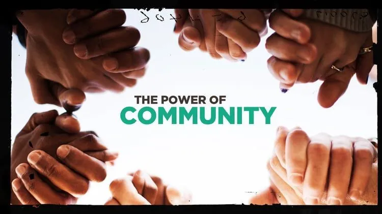 Hands joined together around the words The Power of Community.